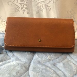 New Brown Wallet. It’s simple and basic wallet. Snap front.